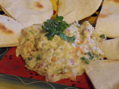Serve Baba Ghanoush with parsley leaves