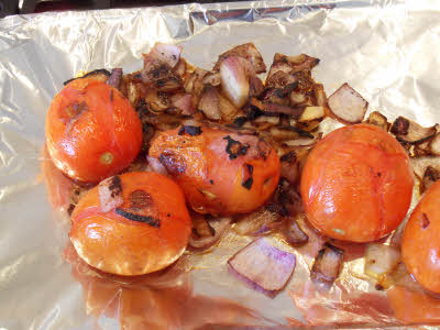 Baked onion, tomato, garlic for roasted tomato chutney