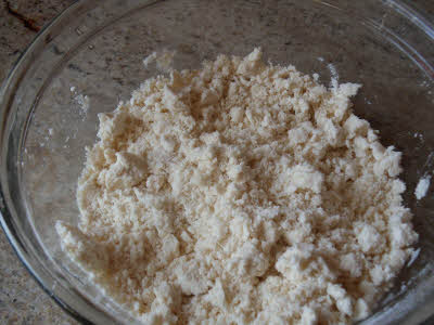Rub oil in flour