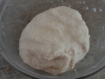 Knead kulcha bread dough