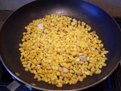 Roast corn and garlic for enchilada sauce