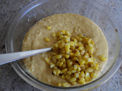 mix corn in enchilada sauce