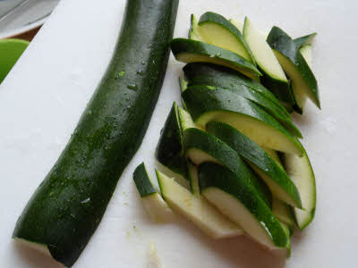 Chop vegetables for enchilada filling