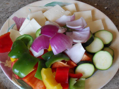 Chop vegetables for satay