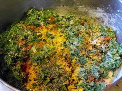 Chop coriander for Kothimbir Vadi