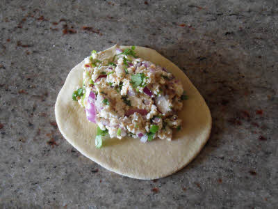 Stuff the dough with filling for paneer parantha