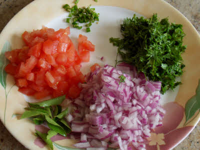 Chop vegetables for tomato rice