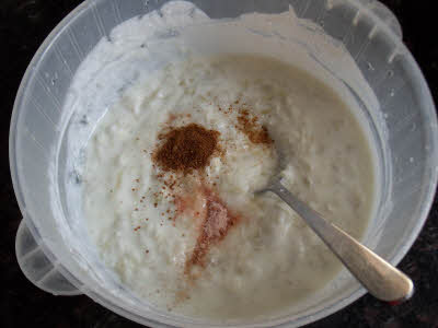 Mix all the spices and drained lauki in yogurt