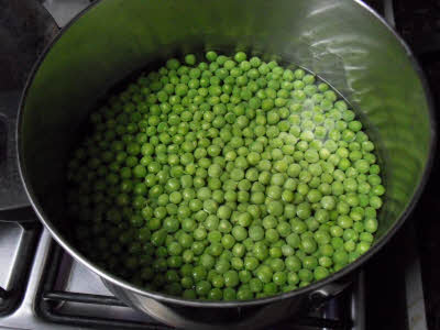 Boil shelled peas