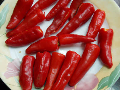 Slit the chillies
