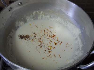Add saffron, cardamom powder and sugar
