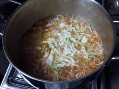 Add cabbage to Vegetable Thukpa