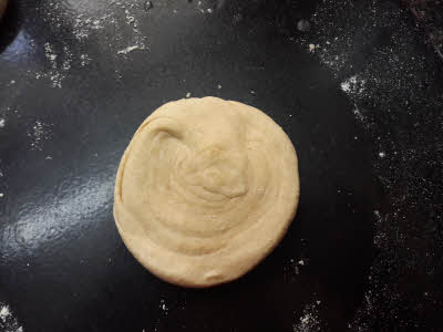 Press the dough with your palm