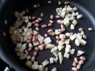 Saute potatoes for Samak Rice Upma