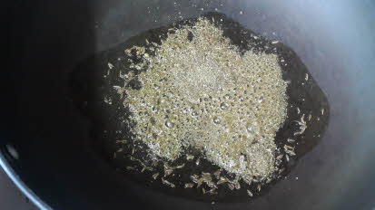 Frying spices for potato curry