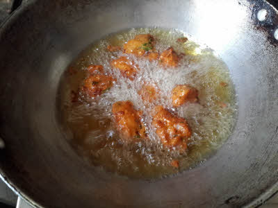 Frying Ram Laddoo