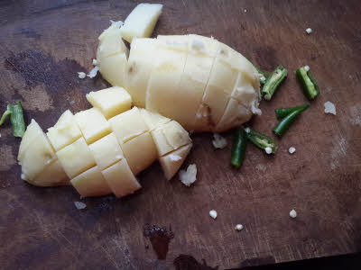 Prepare potatoes and chillies