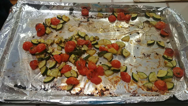Toss tomatoes, zucchini and half of thyme