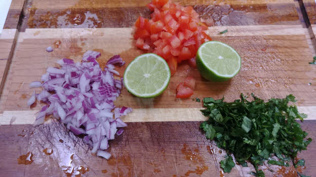 Chop the vegetables for salsa