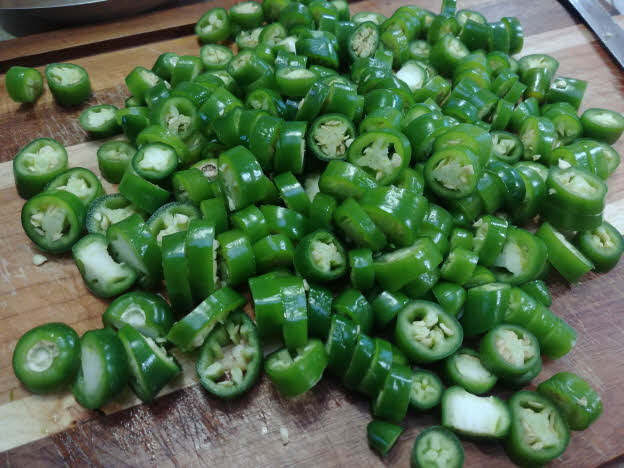 Chop green chillies