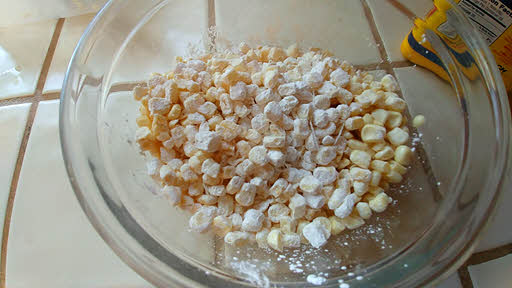 Combine corn starch, salt, crushed pepper with corn kernel