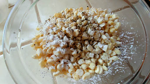 Combine corn starch, salt, crushed pepper with corn kernel