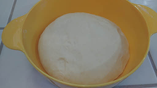 Proofing pizza dough