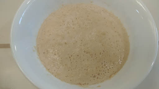 Combine yeast, sugar and 1/4 cup of warm water