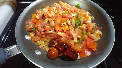 Cook tomatoes, kari leaves and salt