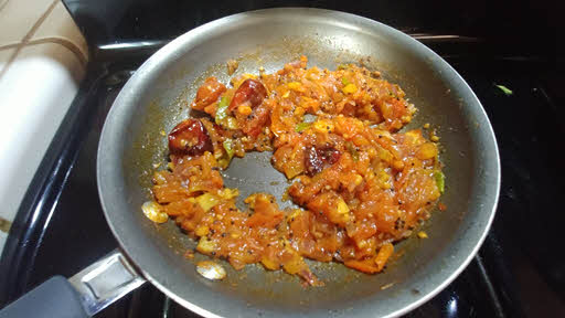 Cook tomatoes, kari leaves and salt