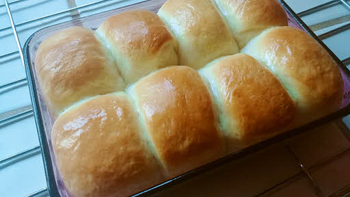Brush the buns with melted butter
