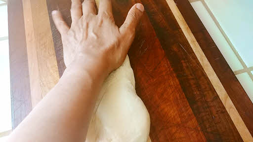 Use the stretch and roll method until the dough is silky smooth