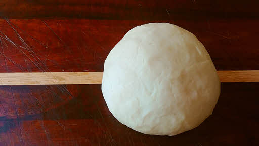 Use the stretch and roll method until the dough is silky smooth