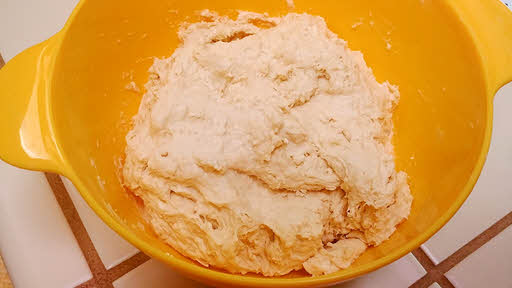 Combine yeast, warm water, flour and salt in a big bowl