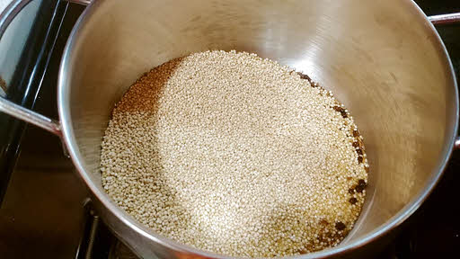 Now pour quinoa, without the water in the pan