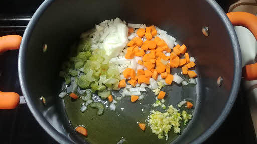 Add onion, carrots, celery and garlic