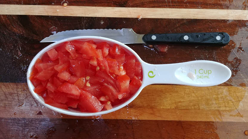 Chop tomatoes finely