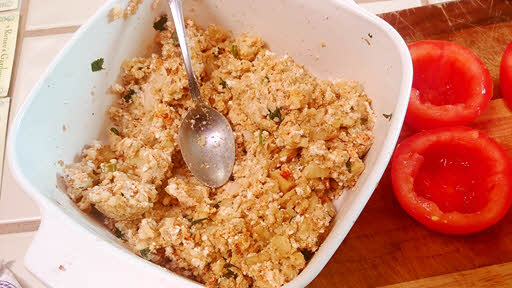 Fill tomatoes with the potato and paneer filling