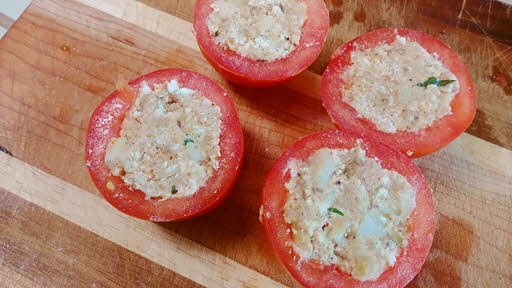 Fill tomatoes with the potato and paneer filling