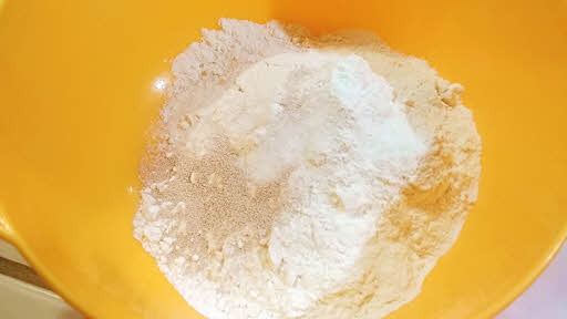 Mix flour, salt, sugar, yeast and oil