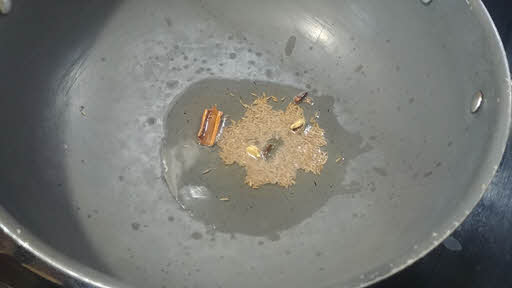 add the cumin seeds, cloves, cardamom and cinnamon stick