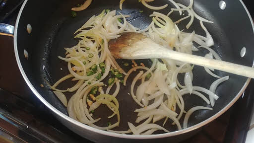 Cook onion and green chilli