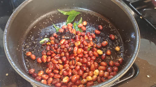 Add fried peanuts, tamarind paste, salt and sugar