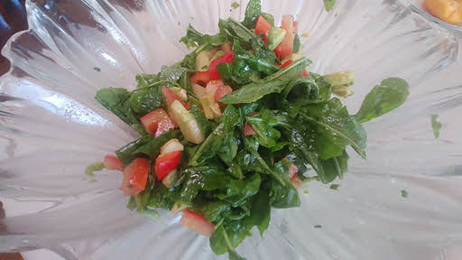 Arugula salad is ready to serve