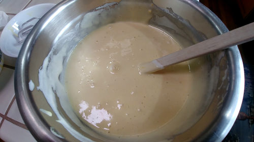 Fold in the egg white mixture in the flour mixture