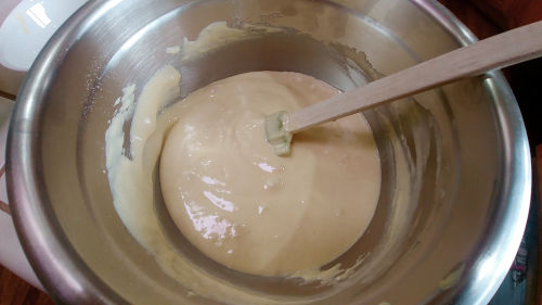 fold in the egg yolk mixture in the flour mixture