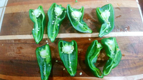 Cut the poblano peppers in half length wise