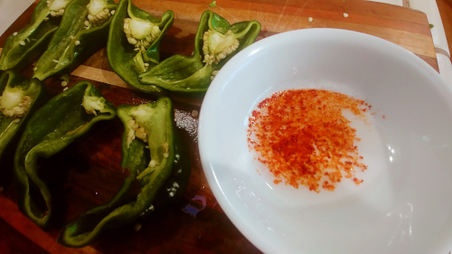 smear the outer side of the peppers with a little chilli oil