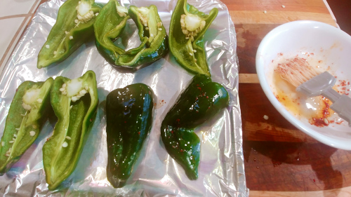 smear the outer side of the peppers with a little chilli oil