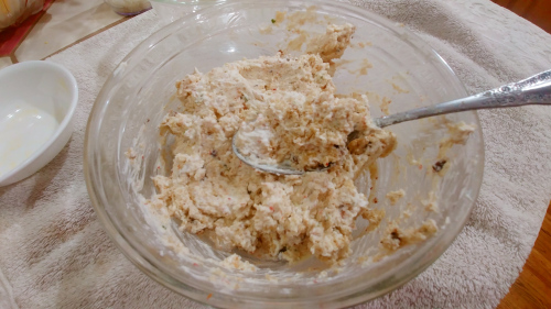 In a big bowl add hung curd, bread crumb mixture, salt and red chilies